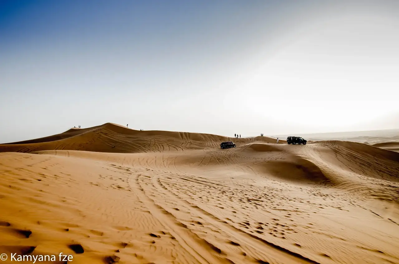 Desert dunes with 4x4 tracks outside Dubai