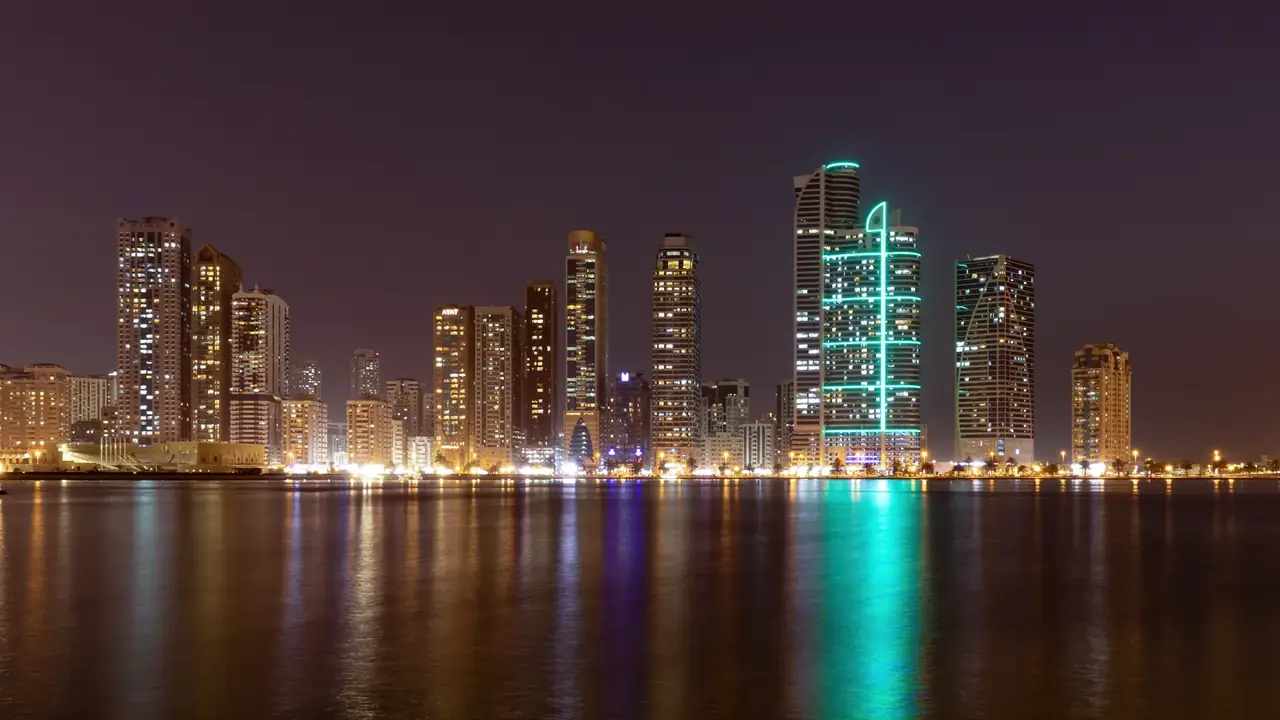Sharjah waterfront towers at night